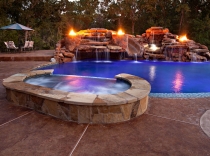 Custom Grotto Waterfall Slide Fire Bowls and Spa