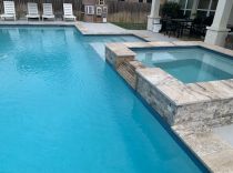 Custom-Inground-pool-and-spa-with-spillway