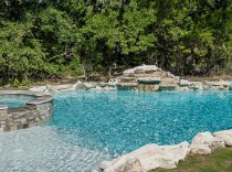 Custom Pool with Raised Spa and Waterfall 100K-and-above