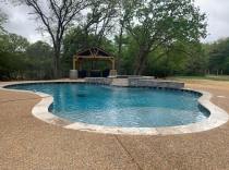 Custom pool and raised circular spa 100K-and-above