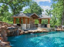 Freeform-pool-with-raised-spa-and-grotto
