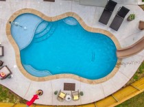 Freeform-pool-with-tanning-ledge-and-slide1