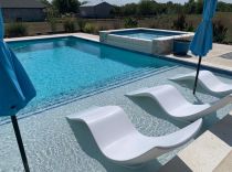 Geometric-Pool-and-spa-with-ledge-loungers