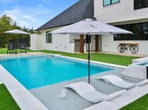 Geometric-Pool-with-Ledge-Loungers-and-Bubblers