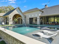 Geometric-pool-with-tanning-ledge-and-ledge-loungers2