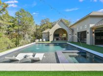 Geometric-pool-with-tanning-ledge-and-ledge-loungers4