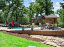 Inground-pool-with-raised-spa-and-rockwaterfalls