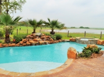 Custom Pool and Spa with Sundeck and Waterfall 80K-to-100K