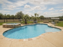 Freeform-swimming-pool-and-spa-with-sheer-descent-and-bubblers 80K-to-100K
