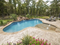 Freeform Swimming Pool with Rock Waterfall Bubblers and Beach Entry 80K-to-100K