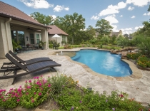 Custom Pool with Rock Waterfall Bubblers and Sundeck 65-to-85K