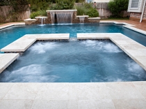 Sleek Travertine and Glass Tile Spa