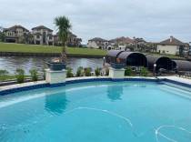Custom pool with fire bowls