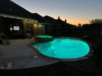 Freeform-pool-with-raised-spa-and-LED-lights