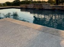 Geometric-pool-with-raised-brick-wall