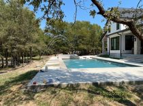 Geometric pool with raised spa