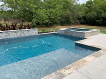 Geometric-pool-with-raised-spa-and-bubblers