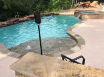 custom-pool-and-spa-with-beach-entry-and-bubblers-min
