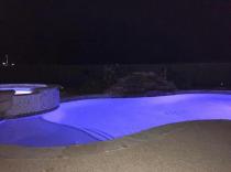 freeform-pool-with-raised-spa-and-LED-lights