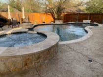freeform-pool-with-raised-spa-min