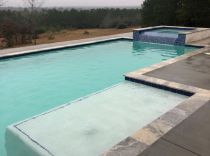geometric-pool-and-spa-with-tanning-ledge-min