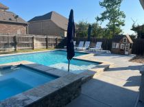 Geometric pool with raised spa