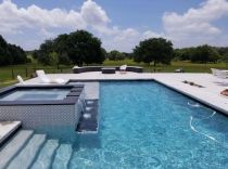 geometric-pool-with-raised-spa-min