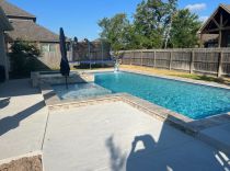 Geometric pool with raised spa