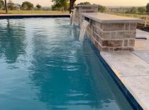Geometric-pool-with-raised-wall-and-sheer-descents